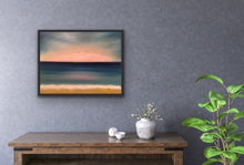 Load image into Gallery viewer, Studio Brambilla Aware Winning Toronto Artist: Home Decor: Sunrises create the most amazing views don't they? Here I have tried to recreate a beautiful view showing clouds at the horizon being turned into pink cotton balls with flashes of sunlight radiating out above the clouds. Sheer bliss as you walk along the beach with the waves licking your toes. This is oil on canvas and is 22"x28" surrounded by a black floating frame.