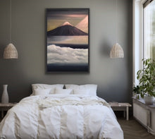 Load image into Gallery viewer, Mt Fuji is one of the most beautiful mountains (volcanos) in the world and rightly so. It is breathtaking. This painting is based on a photo taken by a friend standing atop a promontory high above the clouds as Fuji makes its appearance in the morning with the sun coming in from the right. Ironically Fuji is only visible about 90 days per year so this was great timing. The snow capped peak and the sunlight are rendered in high quality metallic oils so that the colours change depending on where you stand to
