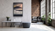 Load image into Gallery viewer, Mt Fuji is one of the most beautiful mountains (volcanos) in the world and rightly so. It is breathtaking. This painting is based on a photo taken by a friend standing atop a promontory high above the clouds as Fuji makes its appearance in the morning with the sun coming in from the right. Ironically Fuji is only visible about 90 days per year so this was great timing. The snow capped peak and the sunlight are rendered in high quality metallic oils so that the colours change depending on where you stand to