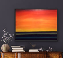 Load image into Gallery viewer, Studio Brambilla Aware Winning Toronto Artist: Home Decor: Need a splash of colour in your room? This beauty is all about creating an understated splash. With its deep blue water and multiple shades of yellow and orange which are blended together imperceptibly, you can transform any room by providing a view of a beautiful summer sunrise over the lake.  This simple yet elegant image is a large 36&quot;x48&quot; oil on canvas surrounded with a black floating frame. 
